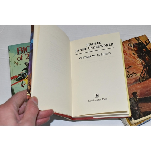 409 - JOHNS; CAPT. W.E, Four titles comprising Biggles In The Underworld, First Edition published by Brock... 