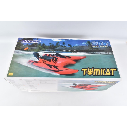 101 - FOUR BOXED MOTORISED TOY VEHICLES, to include two Ripmax Tomkat boats, bother numbered B-RTR2100 but... 