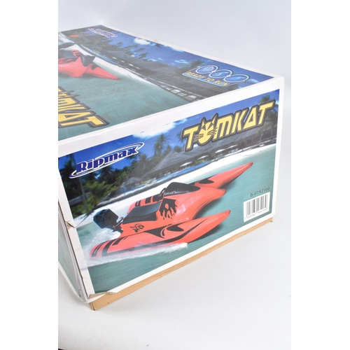 101 - FOUR BOXED MOTORISED TOY VEHICLES, to include two Ripmax Tomkat boats, bother numbered B-RTR2100 but... 