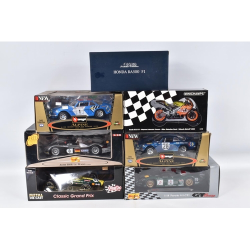 120 - SEVEN BOXED DIECAST MODEL RACING VEHICLES, the first a 1:18 scale Quartzo Classic Grand Prix Lotus 4... 