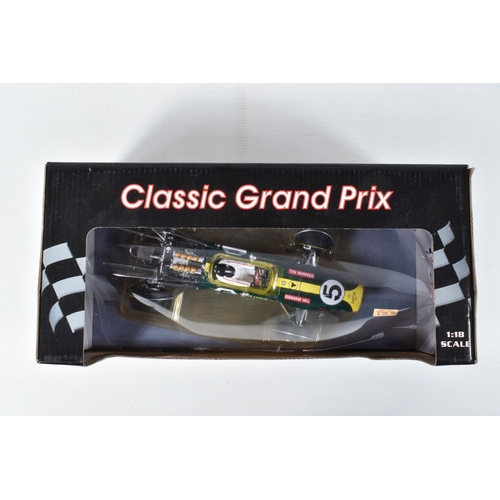 120 - SEVEN BOXED DIECAST MODEL RACING VEHICLES, the first a 1:18 scale Quartzo Classic Grand Prix Lotus 4... 