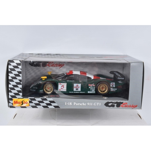 120 - SEVEN BOXED DIECAST MODEL RACING VEHICLES, the first a 1:18 scale Quartzo Classic Grand Prix Lotus 4... 