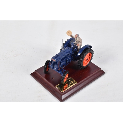 126 - THREE BOXED MODEL AGRICULTURAL VEHICLES, to include two Britains 1945 Fordson E27N Major Tractors wi... 