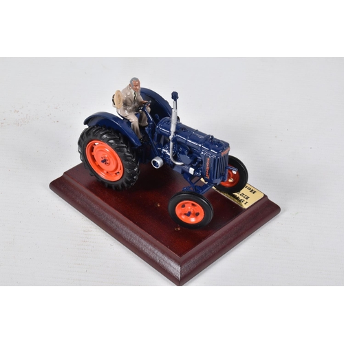 126 - THREE BOXED MODEL AGRICULTURAL VEHICLES, to include two Britains 1945 Fordson E27N Major Tractors wi... 