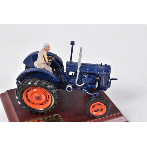 126 - THREE BOXED MODEL AGRICULTURAL VEHICLES, to include two Britains 1945 Fordson E27N Major Tractors wi... 