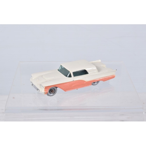 147 - A BOXED MOKO LESNEY FORD THUNDERBIRD, No.75, darker blue base, silver plastic wheels, two with hairl... 