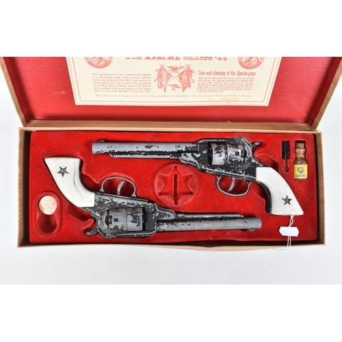 172 - A BOXED BCM OUTLAW CAP GUNS SET, comprising two replica Remington Apache revolvers, both appear comp... 