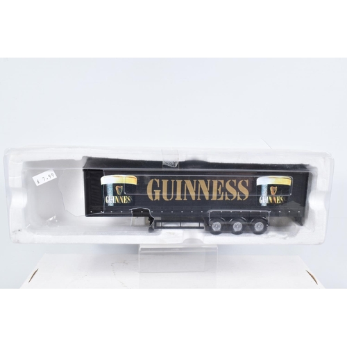 215 - SEVEN BOXED AND ONE UNBOXED MODEL EDDIE STOBART AND GUINNESS VEHICLES, the first a Corgi Eddie Stoba... 