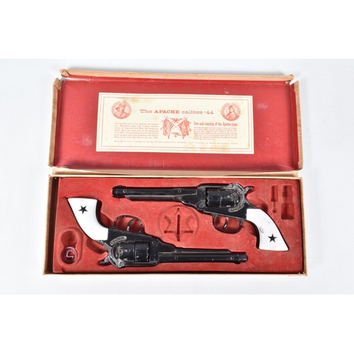 230 - TWO BOXED BCM OUTLAW CAP GUN SETS, each box contains two replica calibre - 44 revolvers signed Apach... 