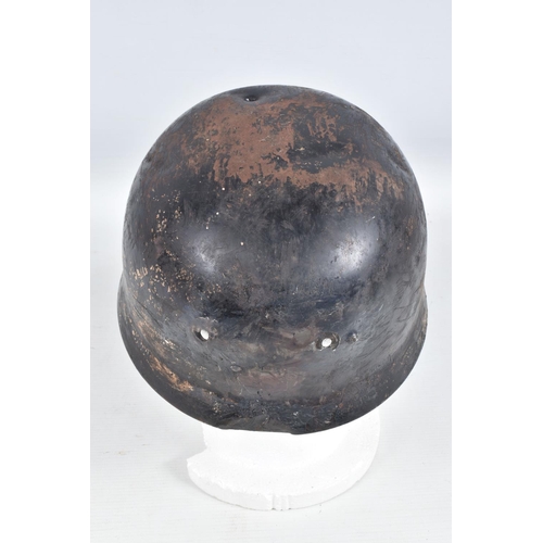 539 - A WWII RELIC OF A GERMAN HELMET, this appears to be a Fallschirmjager or Paratroopers helmet, the ve... 