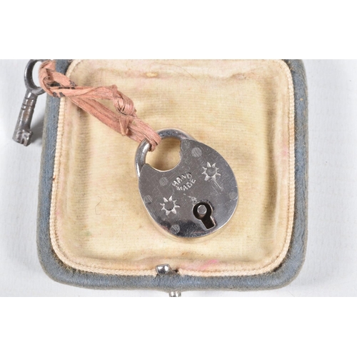 10 - A 'FINDLAY & CO' STOP WATCH AND A PADLOCK, base metal stop watch, together with a base metal padlock... 