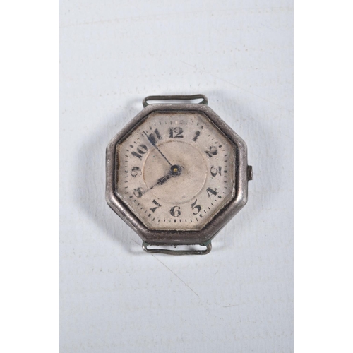 28 - FOUR MID 20TH CENTURY WATCH HEADS, to include a white metal 'Olma' watch head, missing crown, approx... 