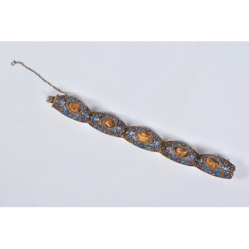 4 - A GEMSET BRACELET, comprised of five domed panels with filigree and enamel detail, each panel set wi... 