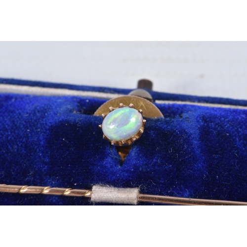 43 - A VICTORIAN 18CT GOLD OPAL STICK PIN/DRESS STUD, oval opal cabochon in a claw setting, removeable, m... 