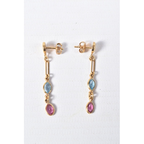 65 - TWO PAIRS OF EARRINGS, to include a pair of oval topaz stud earrings with rope twist surround, and a... 