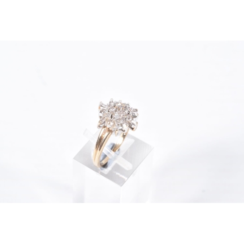 74 - A 9CT GOLD DIAMOND CLUSTER RING, nineteen round brilliant cut diamonds and six baguette cut diamonds... 