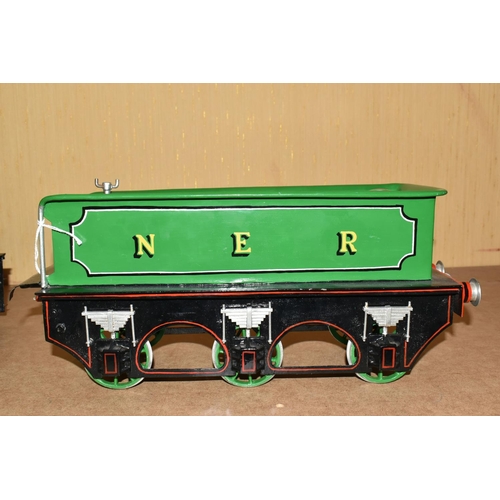 388 - A FIVE INCH GAUGE MODEL OF A NORTH EASTERN RAILWAY CLASS F 4-4-0 LOCOMOTIVE AND TENDER, No.779, in N... 