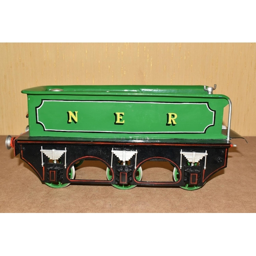 388 - A FIVE INCH GAUGE MODEL OF A NORTH EASTERN RAILWAY CLASS F 4-4-0 LOCOMOTIVE AND TENDER, No.779, in N... 