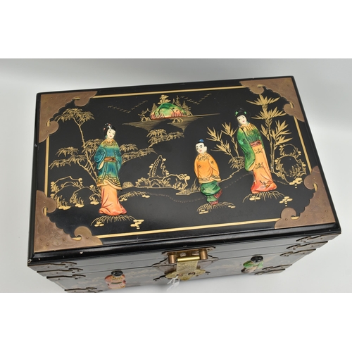 827A - A LATE 20TH CENTURY JAPANESE STYLE BLACK LACQUER JEWELLERY BOX, with decorative brass mounts, gilt d... 