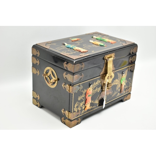 827A - A LATE 20TH CENTURY JAPANESE STYLE BLACK LACQUER JEWELLERY BOX, with decorative brass mounts, gilt d... 