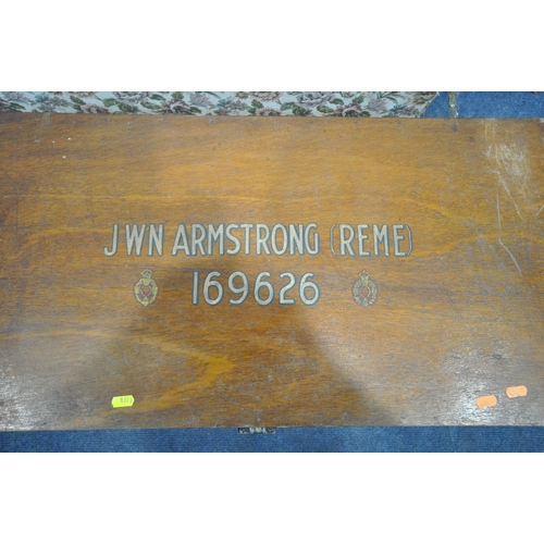 1313 - A 20TH CENTURY WOODEN TRAVELING TRUNK, reading J.W.N ARMSTRONG R.E.M.E 169626, with twin metal handl... 