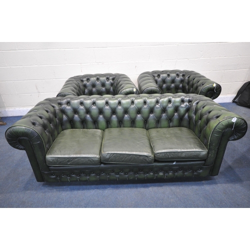 1319 - THOMAS LLOYD, A GREEN LEATHER CHESTERFIELD THREE PIECE SUITE, comprising a three seater sofa, length... 