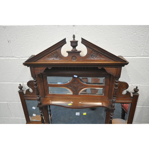 1320 - AN EARLY 20TH CENTURY MAHOGANY OVERMANTEL MIRROR, with broken arch pediment, three finials, turned s... 