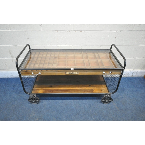 1321 - AN INDUSTRIAL STYLE COFFEE TABLE, the tubular metal frame, cradling a glass top, a single drawer wit... 