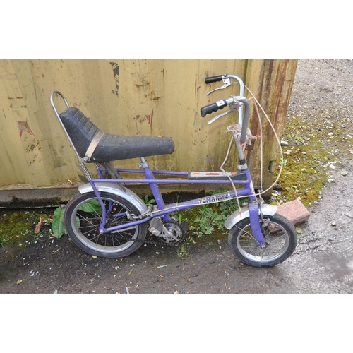 A RALEIGH TOMAHAWK VINTAGE CHILDS BIKE in purple Condition Report bench seat in good order paint a