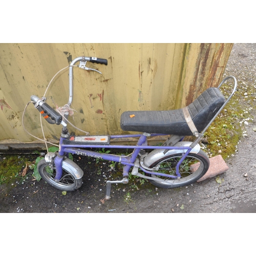 A RALEIGH TOMAHAWK VINTAGE CHILDS BIKE in purple Condition Report bench seat in good order paint a