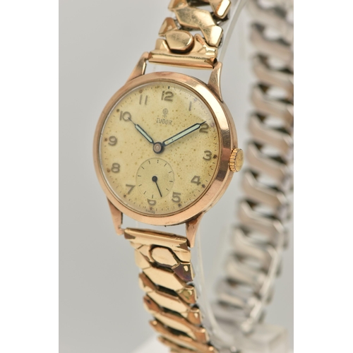 27 - A 9CT GOLD 'TUDOR' WRISTWATCH, hand wound movement, round dial signed 'Tudor', Arabic numerals, subs... 