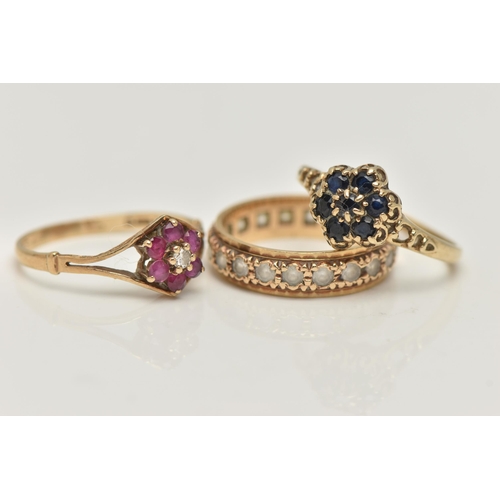 32 - THREE GEM SET RINGS, the first a sapphire floral cluster, hallmarked 9ct London, ring size N, the se... 