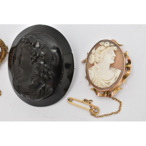 39 - THREE BROOCHES, the first an AF shell cameo brooch collet set in yellow metal with scrolling detail,... 