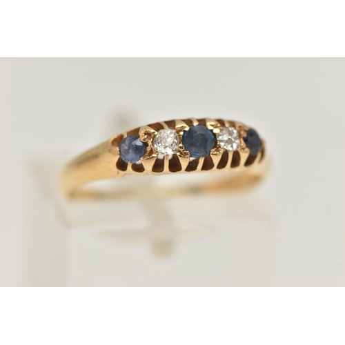 41 - AN EARLY 20TH CENTURY DIAMOND AND SAPPHIRE RING, 18ct yellow gold boat ring, set with three circular... 