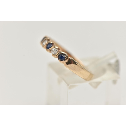 46 - A SAPPHIRE AND DIAMOND SEVEN STONE RING, set with four circular cut sapphires, each measuring approx... 