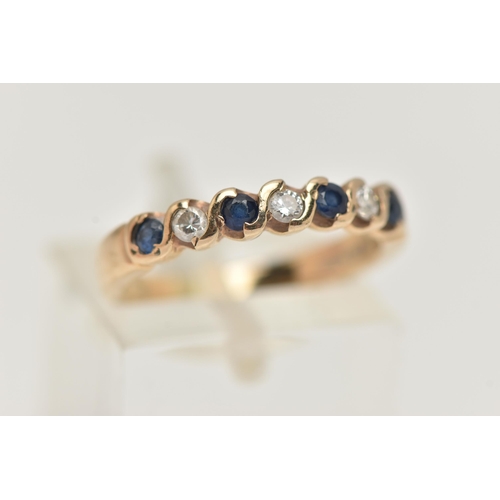 46 - A SAPPHIRE AND DIAMOND SEVEN STONE RING, set with four circular cut sapphires, each measuring approx... 