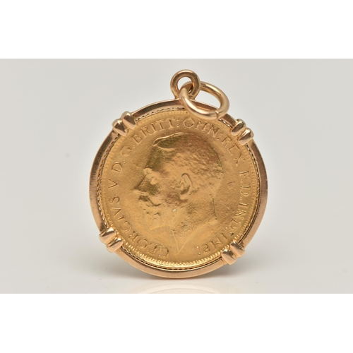 54 - AN EARLY 20TH CENTURY HALF SOVEREIGN PENDANT, half sovereign dated 1917, within a yellow metal mount... 