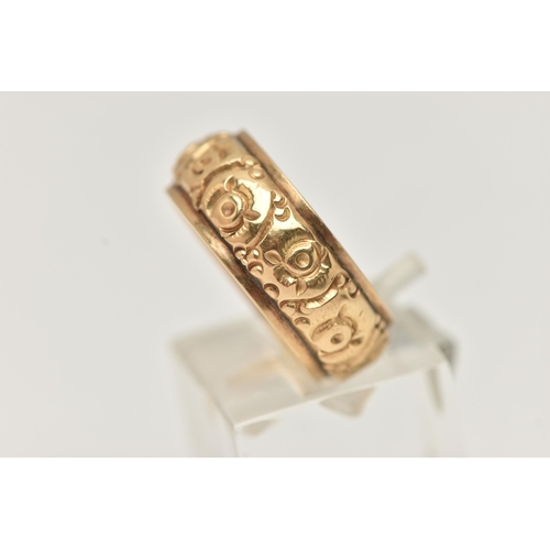 60 - A FLORAL BAND RING, with personal engraving to inner band, stamp rubbed, believed to read 750, ring ... 