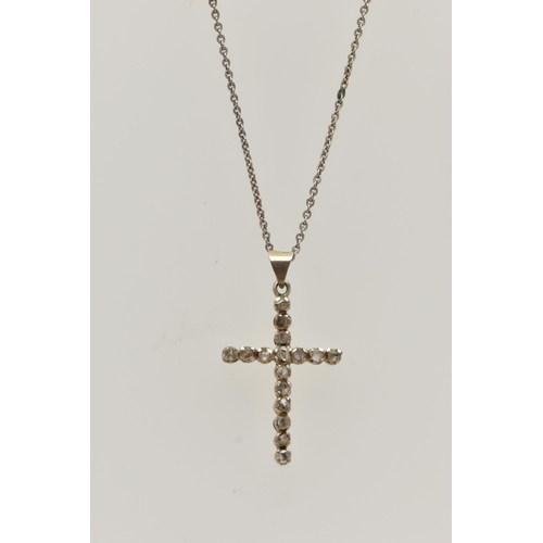 65 - A DIAMOND CROSS PENDANT AND CHAIN, the cross pendant set with rough/flat cut diamonds, suspended fro... 