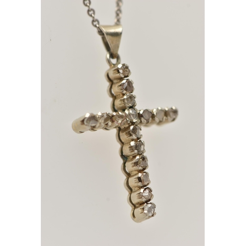 65 - A DIAMOND CROSS PENDANT AND CHAIN, the cross pendant set with rough/flat cut diamonds, suspended fro... 