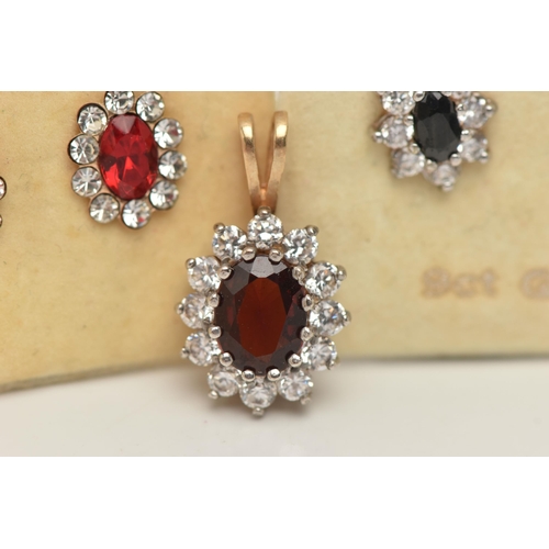 66 - TWO PAIRS OF EARRINGS AND A PENDANT, the 9ct gold cluster pendant with central oval red gem assessed... 