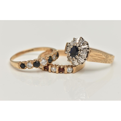 71 - THREE 9CT GOLD GEM SET RINGS, the first a sapphire and diamond cluster ring, the second a seven ston... 