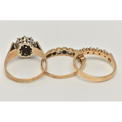 71 - THREE 9CT GOLD GEM SET RINGS, the first a sapphire and diamond cluster ring, the second a seven ston... 