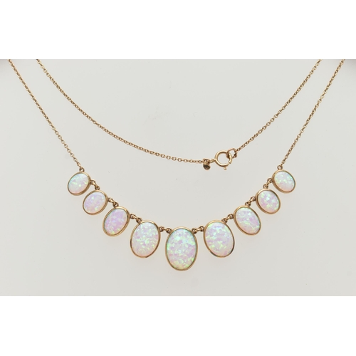 87 - A YELLOW METAL SYNTHETIC OPAL PENDANT NECKLACE, designed as a series of nine graduated synthetic opa... 