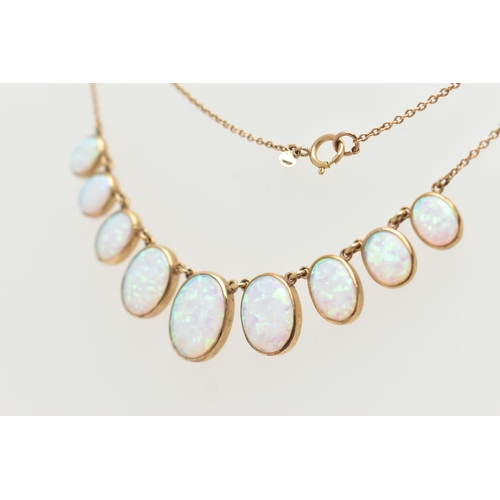 87 - A YELLOW METAL SYNTHETIC OPAL PENDANT NECKLACE, designed as a series of nine graduated synthetic opa... 