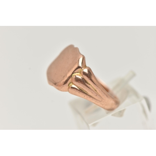 88 - A HEAVY 9CT ROSE GOLD GENTS SIGNET RING, polished shield signet, textured shoulders leading onto a p... 