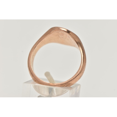 89 - A 9CT ROSE GOLD GENTS SIGNET RING, oval polished form with foliate pattern, leading onto a polished ... 