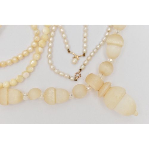 106 - FOUR NECKLACES, the first a Victorian gypsum/selenite carved acorn beaded necklace, restrung with mo... 