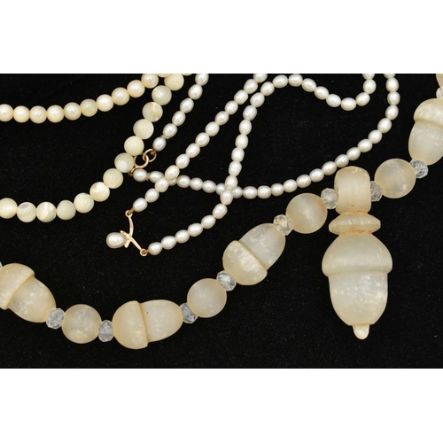 106 - FOUR NECKLACES, the first a Victorian gypsum/selenite carved acorn beaded necklace, restrung with mo... 