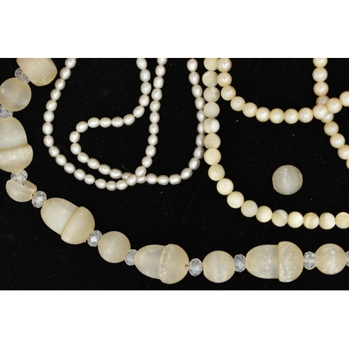 106 - FOUR NECKLACES, the first a Victorian gypsum/selenite carved acorn beaded necklace, restrung with mo... 